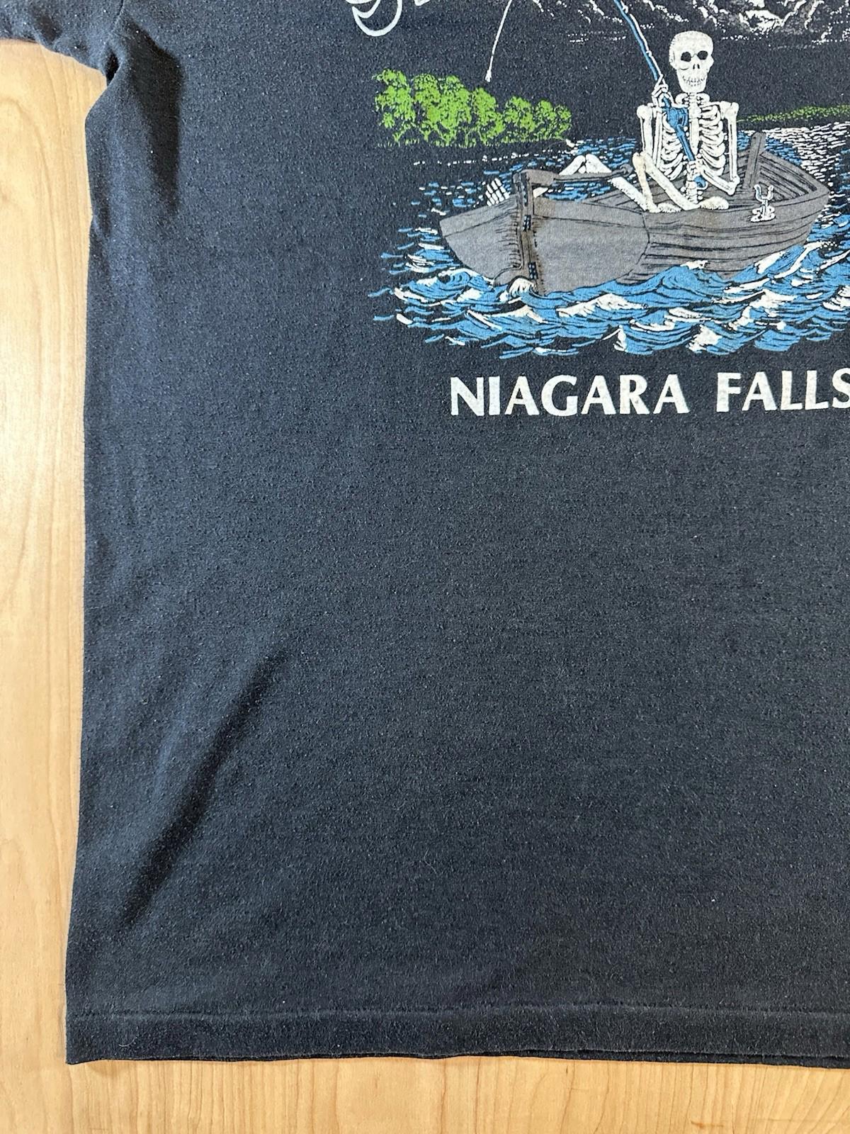 vintage 80's NIAGRA FALLS t shirt FISHING skeleton XL black THE LAST CAST funny