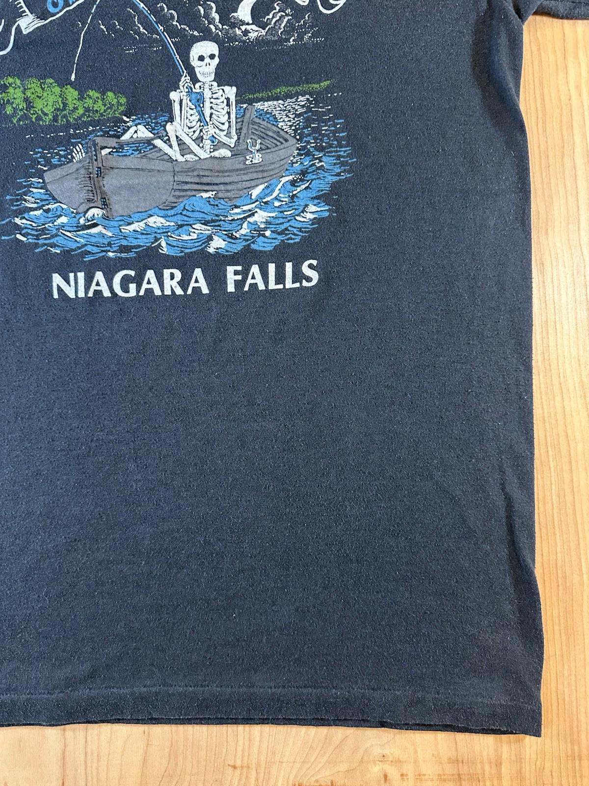 vintage 80's NIAGRA FALLS t shirt FISHING skeleton XL black THE LAST CAST funny