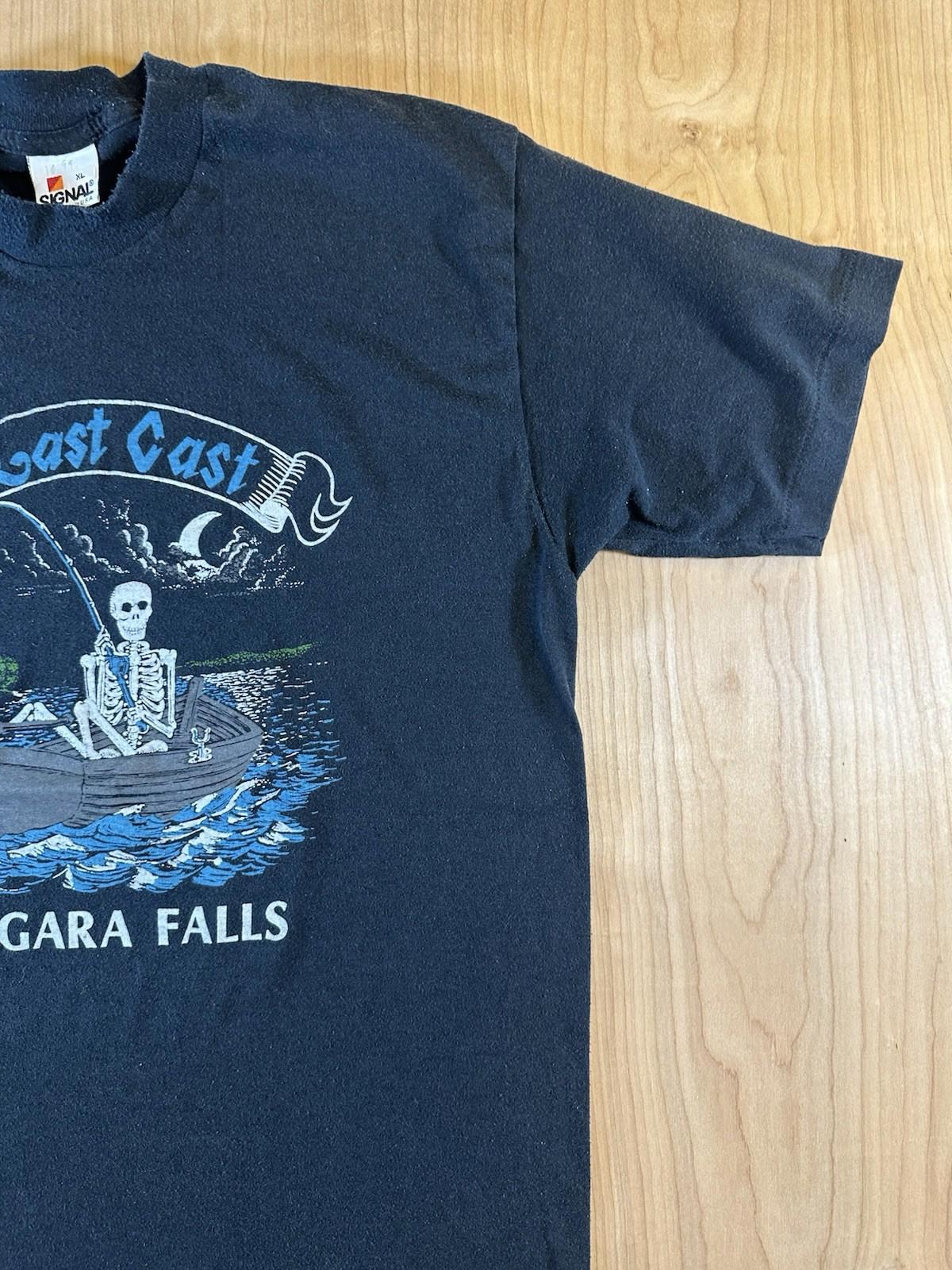 vintage 80's NIAGRA FALLS t shirt FISHING skeleton XL black THE LAST CAST funny