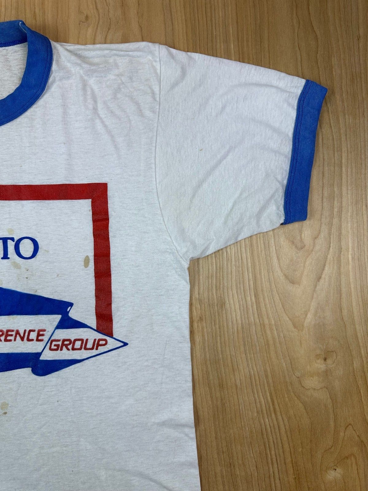 Vintage 80s We're Here to Help tshirt Lawrence Group single stitch ringer patina